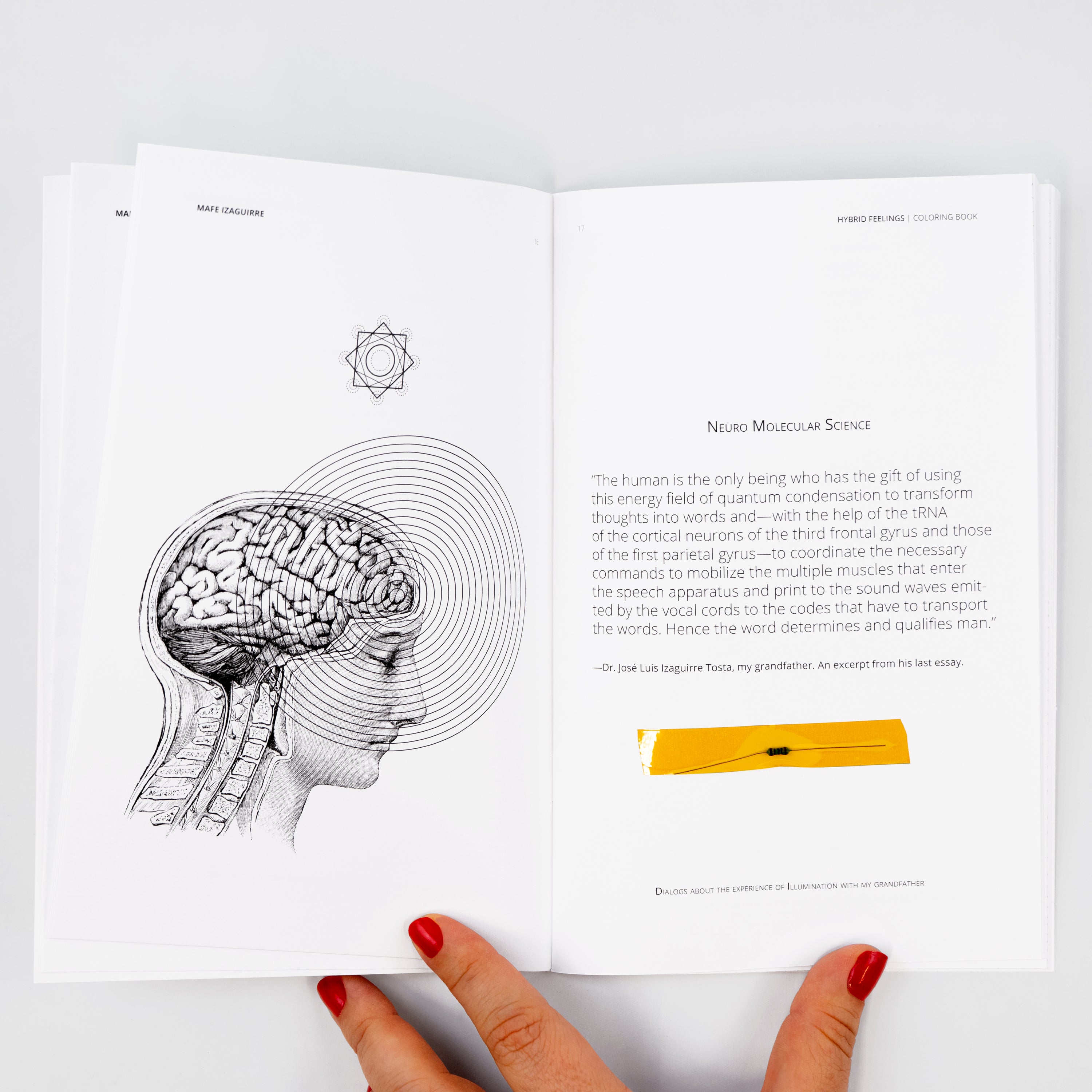 Coloring book opened to pages with illustrated diagrams and infographic-style drawings, text and  resistor taped to the page.