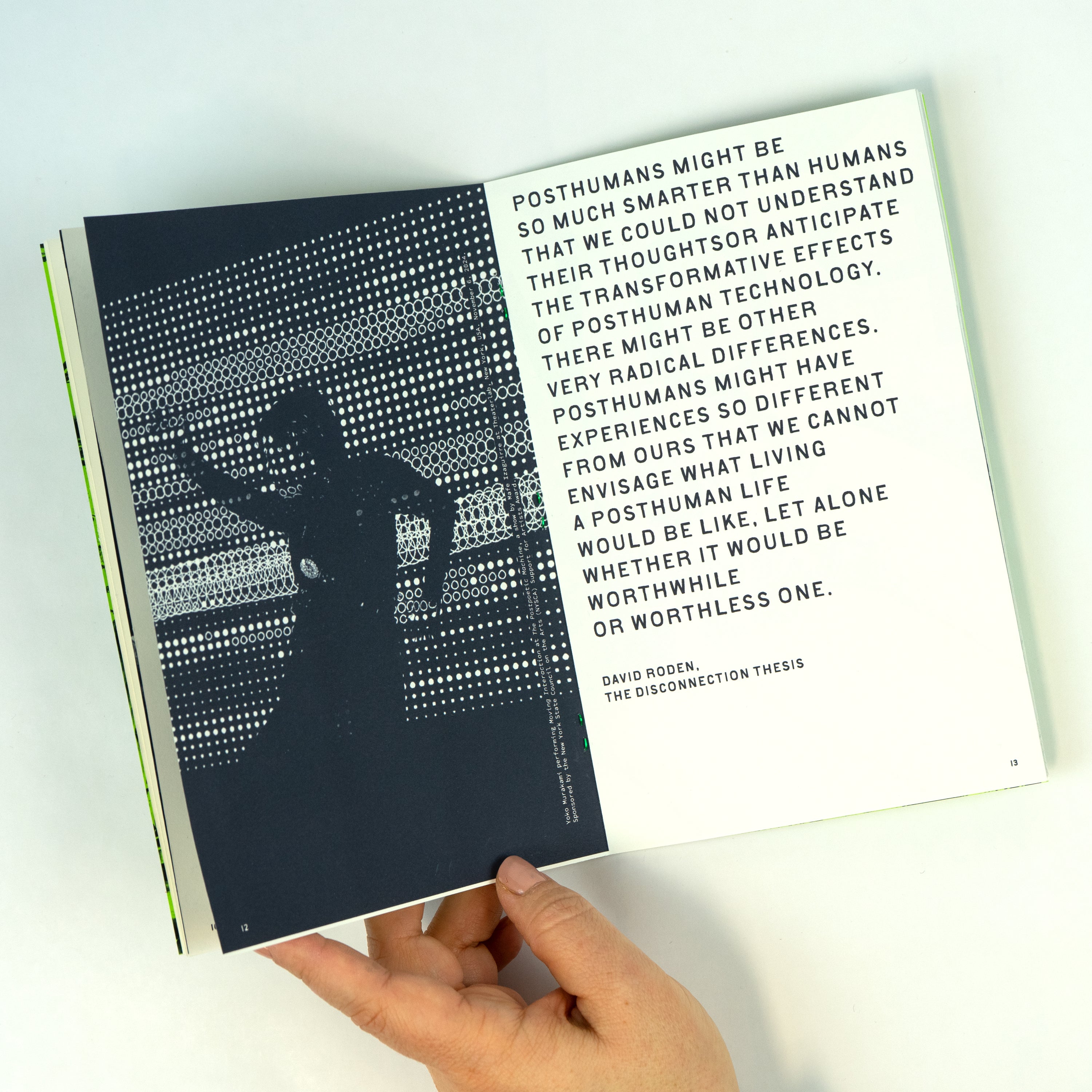 Close-up of an open zine with a photograph on the left page and text on the right page.