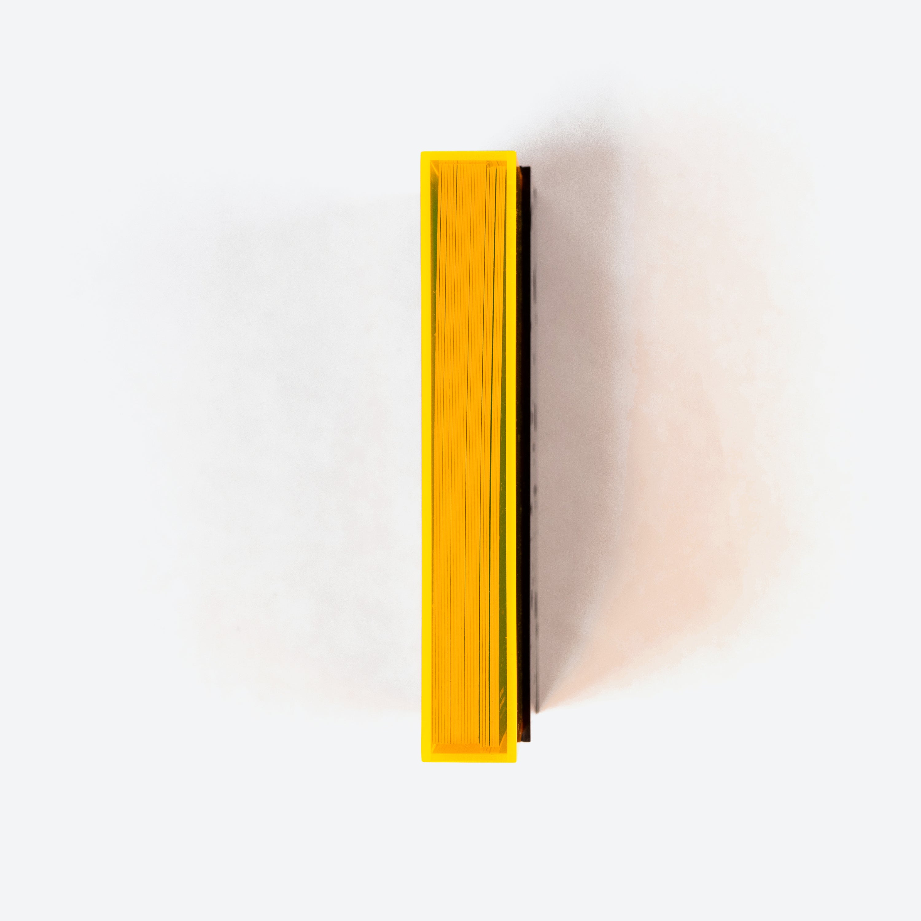 Yellow acrylic box with postcards inside