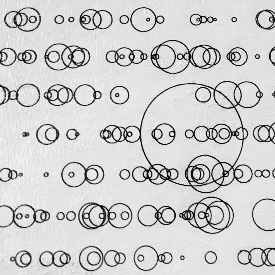 Pattern of interlocking circles on a textured background