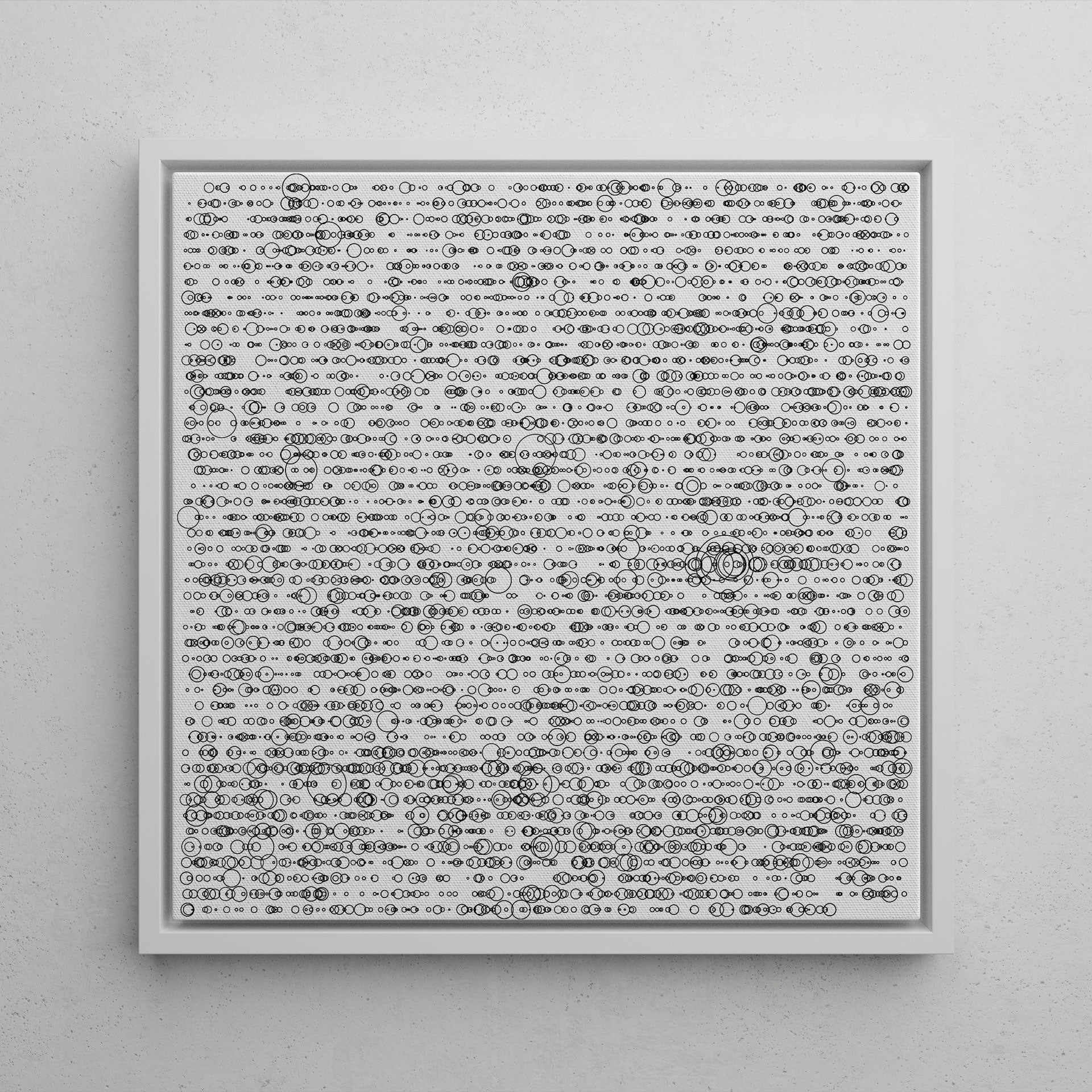 Framed artwork with abstract pattern on a gray wall