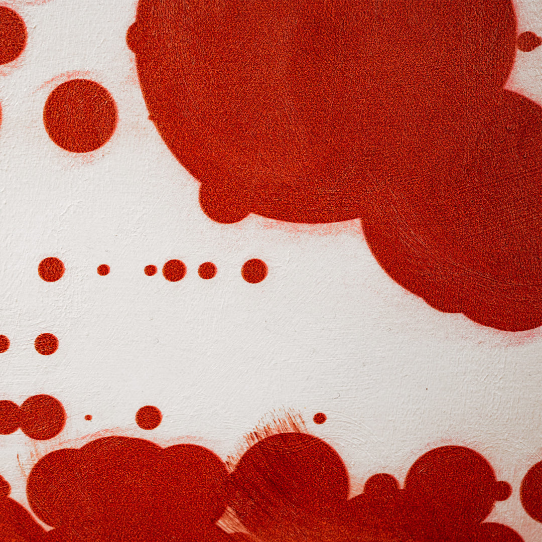 Red abstract shapes on a white background