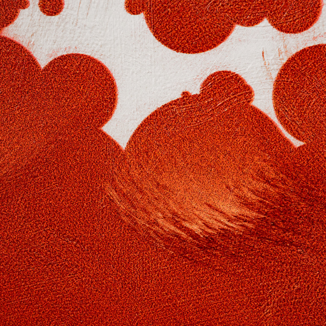Close-up of a textured red canvas with a white background
